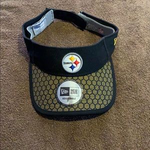Pittsburgh Steelers visor. Velcro back.